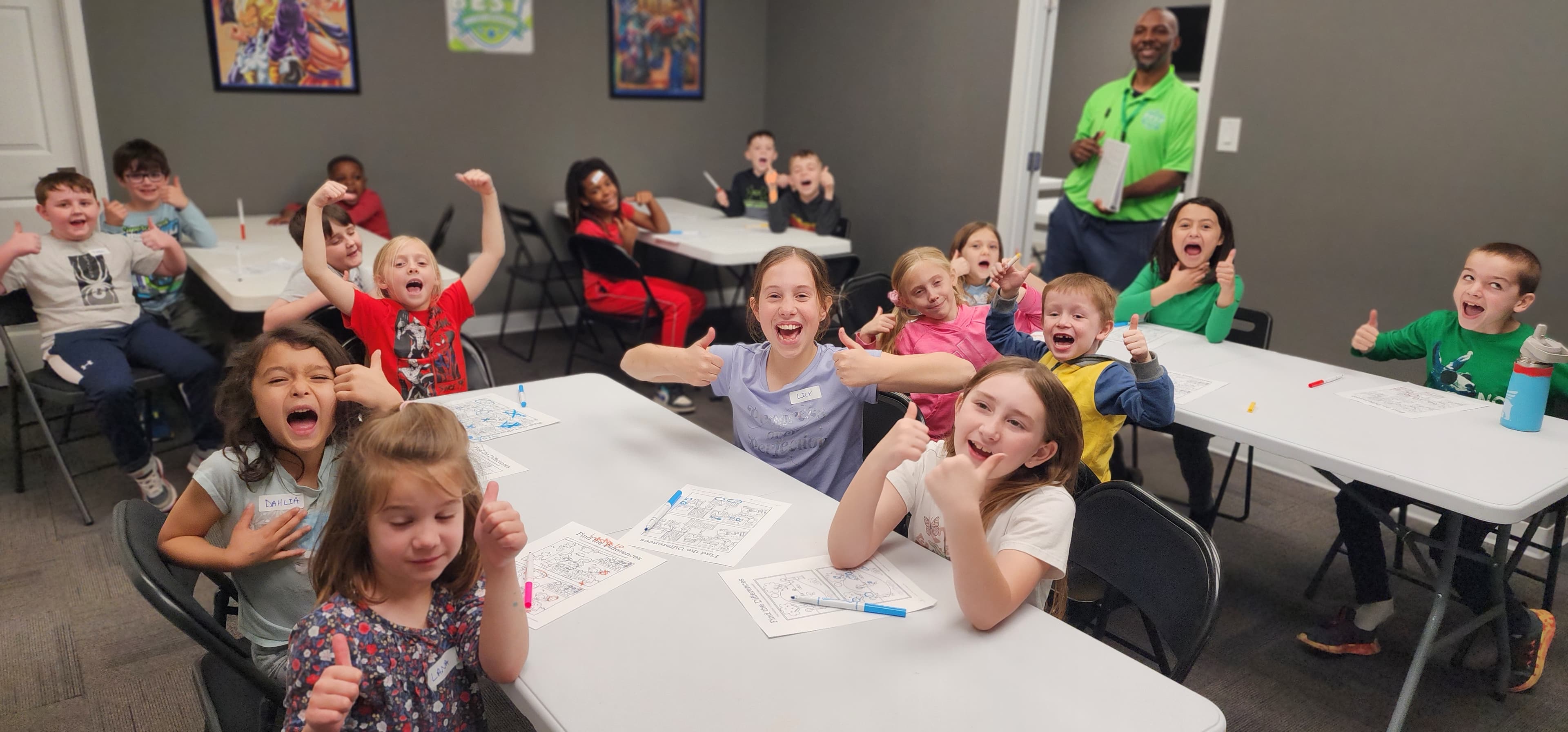 Children gathered around a table with their Plainfield's Best instructor